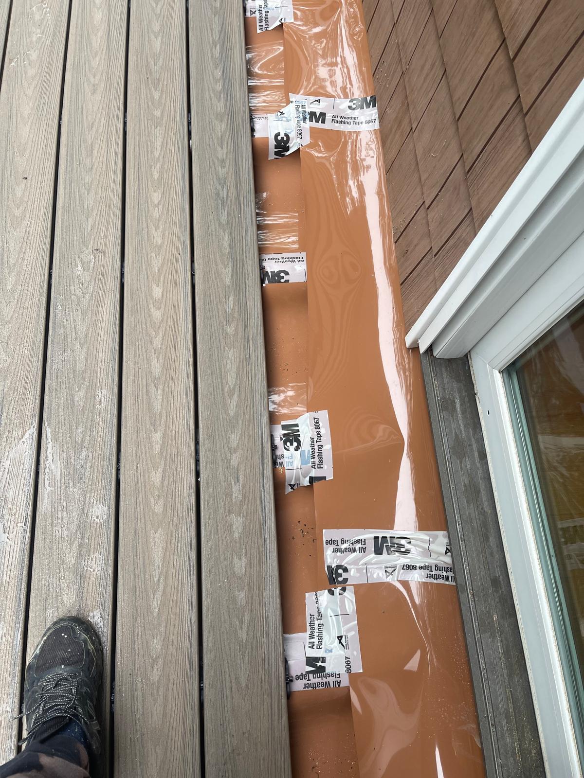 Waterproofing guide for deck construction
