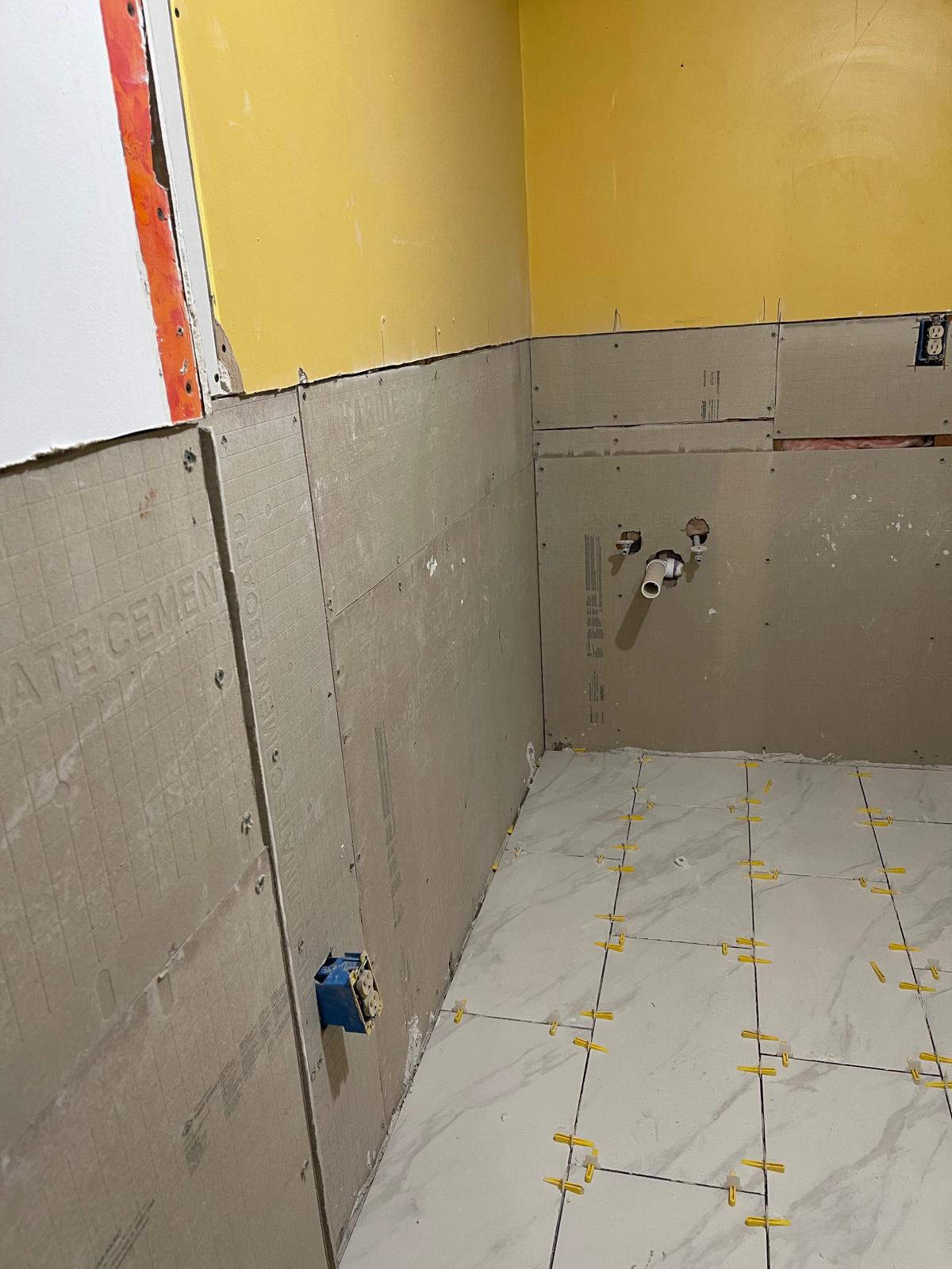 Bathroom renovation in progress with cement board